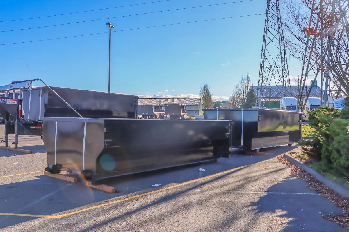 Roll-off dumpster ready for waste disposal at job site for Construction Dumpster Rental in South Fulton
